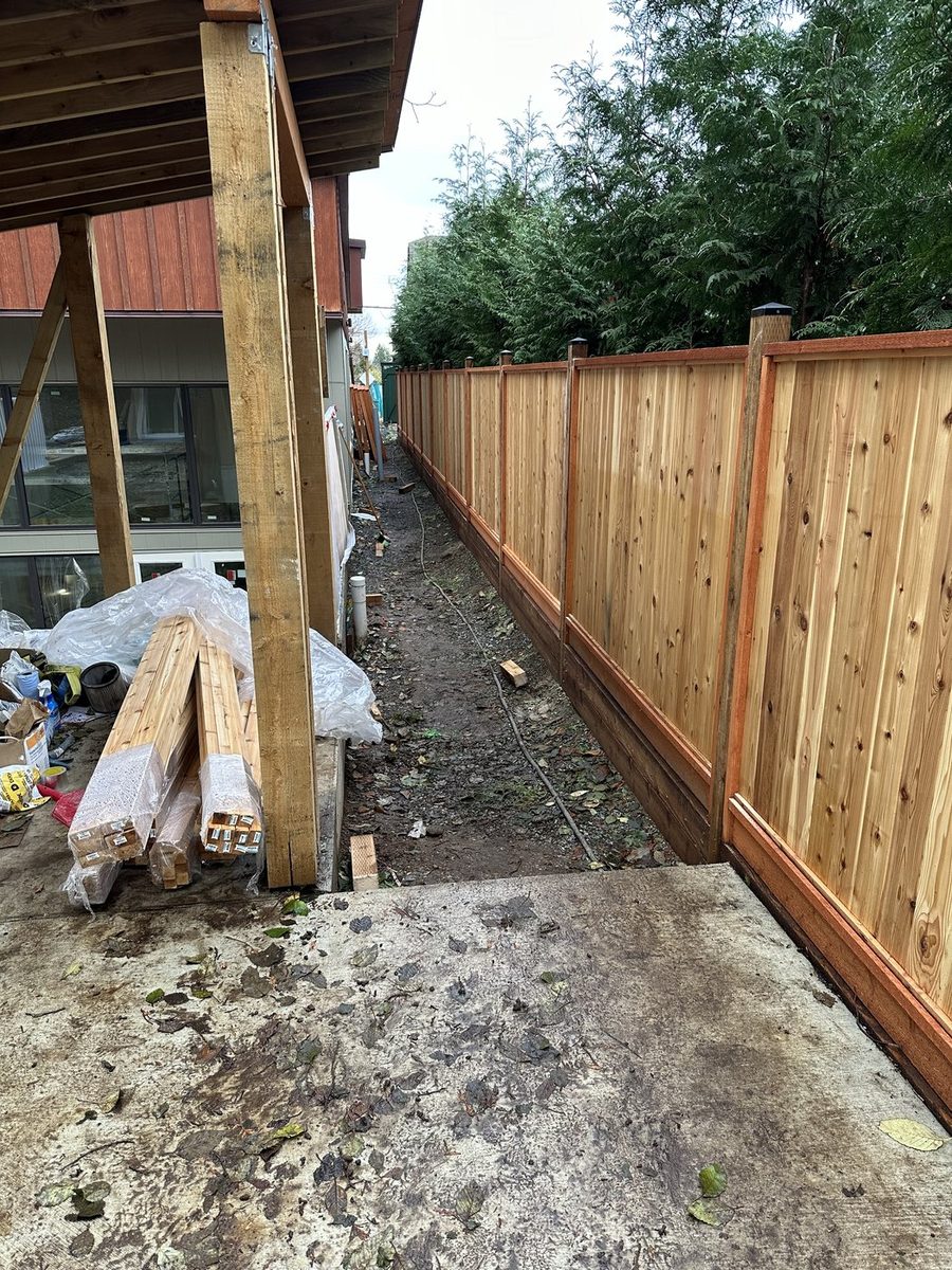 New cedar privacy fence along a side yard