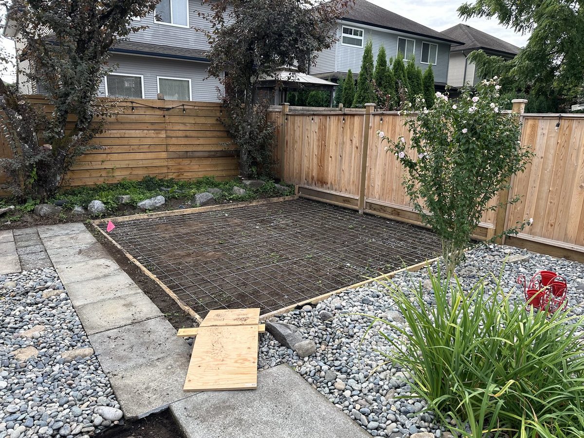 Concrete pad formed with rebar before the pour