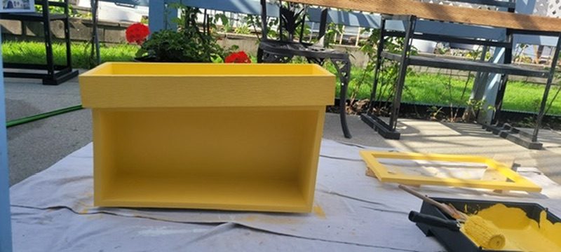 Custom wooden box painted bright yellow