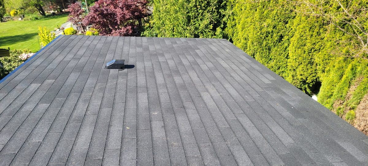Other side of the finished asphalt shingle roof