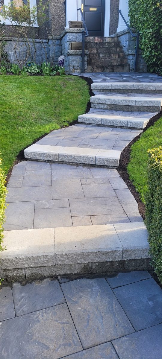 Front walkway & steps after, with new slabs & capped steps