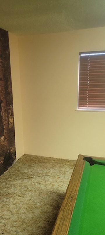 Finished wall painted to match the room