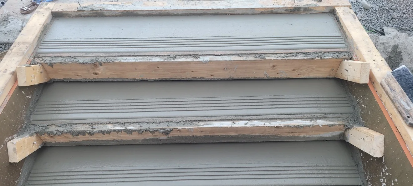 Freshly formed concrete steps in progress